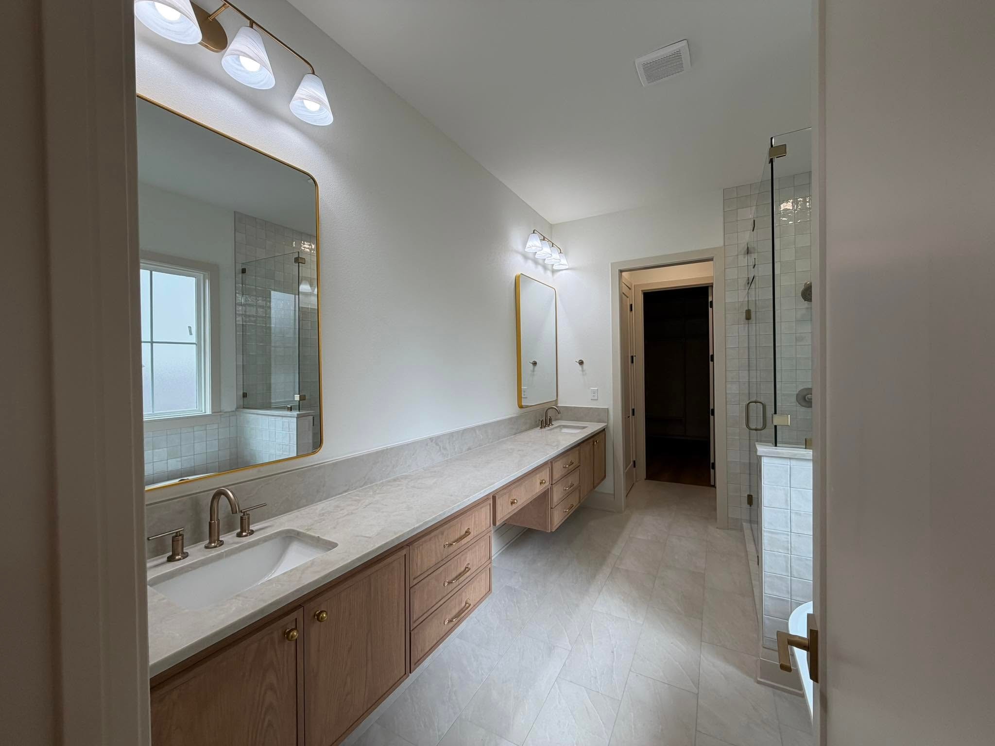Final clean — dual vanity bathroom ready for handoff